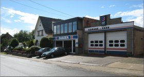 garage-carrosserie DAMIEN te Ransberg, Dorpsstraat.